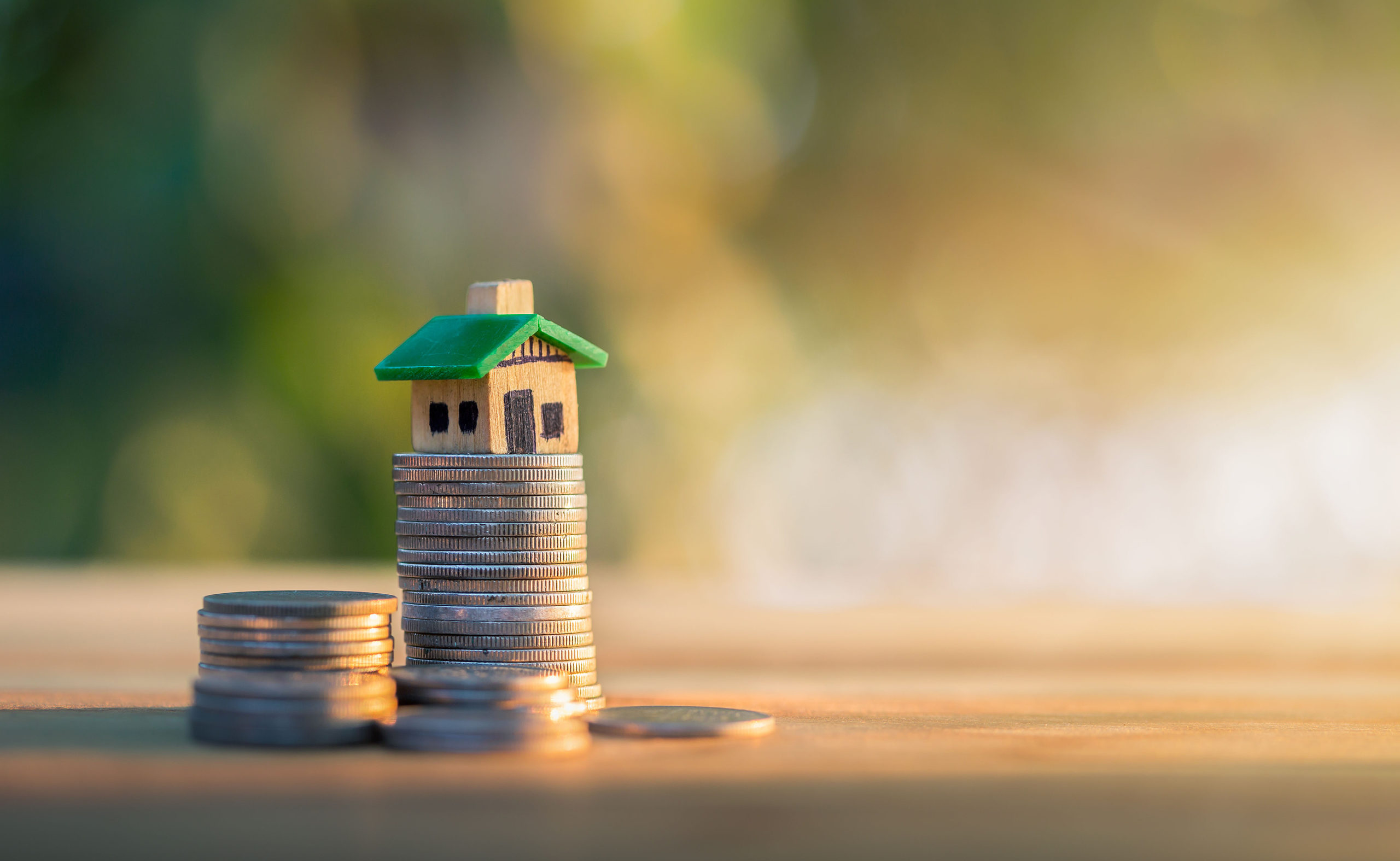 House Placed On Coins. Planning Savings Money Of Coins To Buy A home mortgage